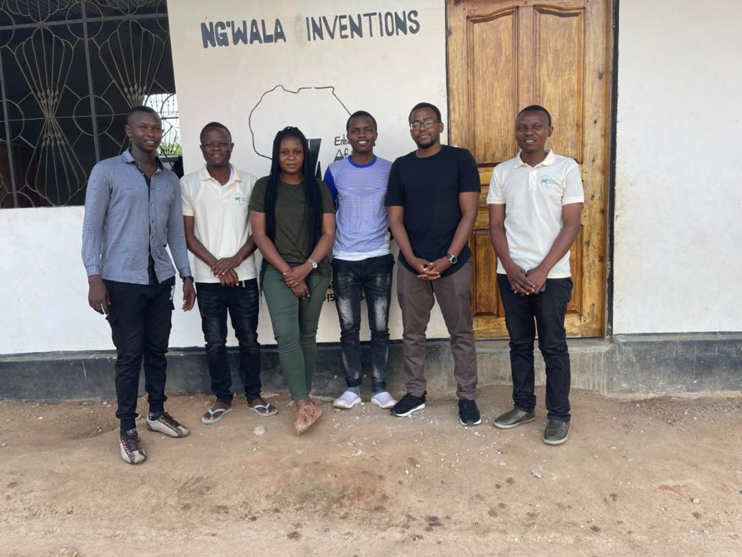 Ngwala Inventions team standing outside the company office